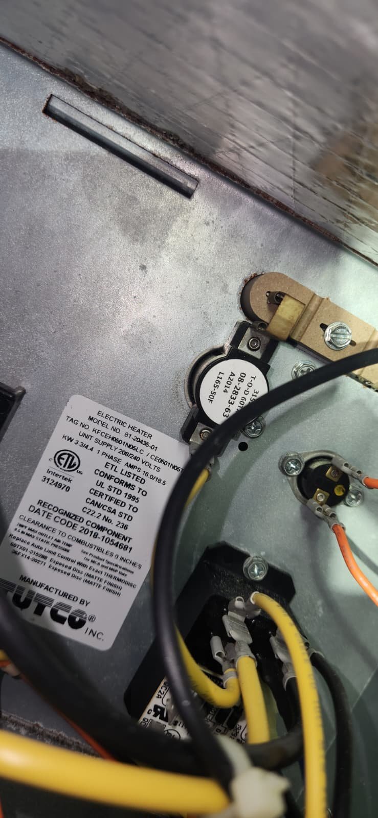 Outdoor AC unit service showing new disconnect switch in Land O' Lakes, FL 34638