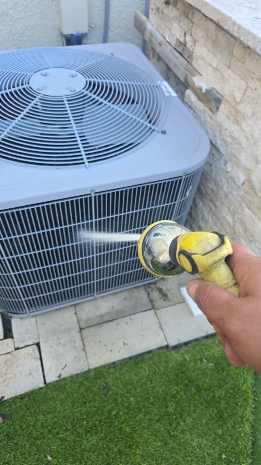 Checking AC system operation after coil and drain line cleaning in Wesley Chapel, FL 33544