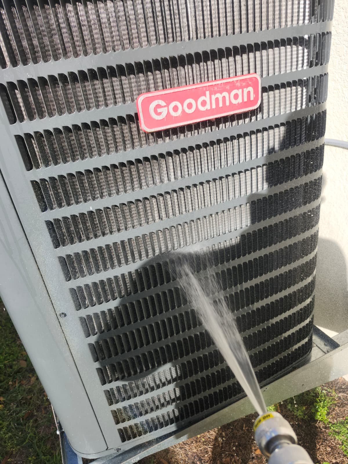 Close-up of replaced AC capacitor in Tampa, FL 33619 service call