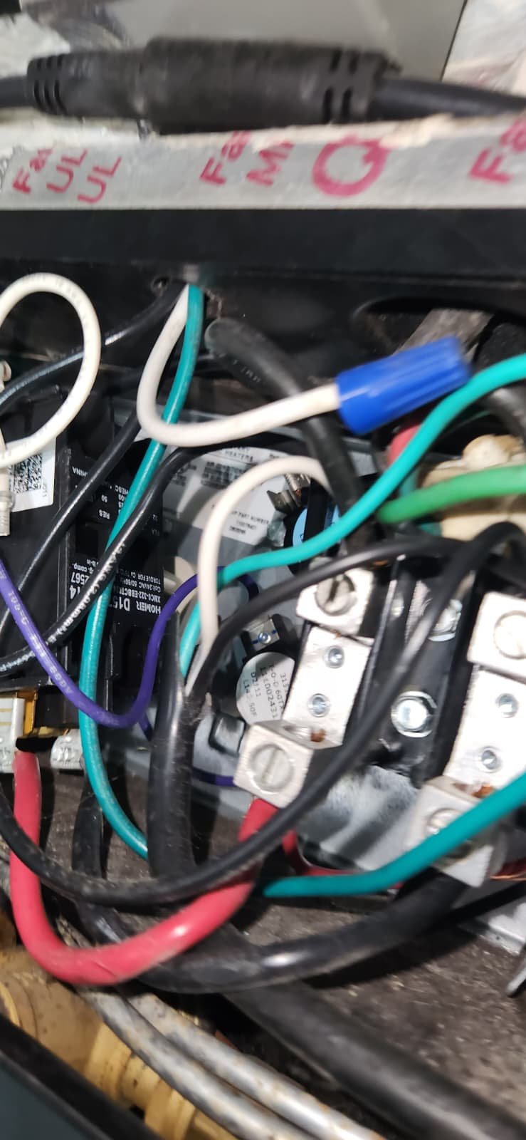 Electric heater wiring and components during replacement in South Pasadena, FL 33707