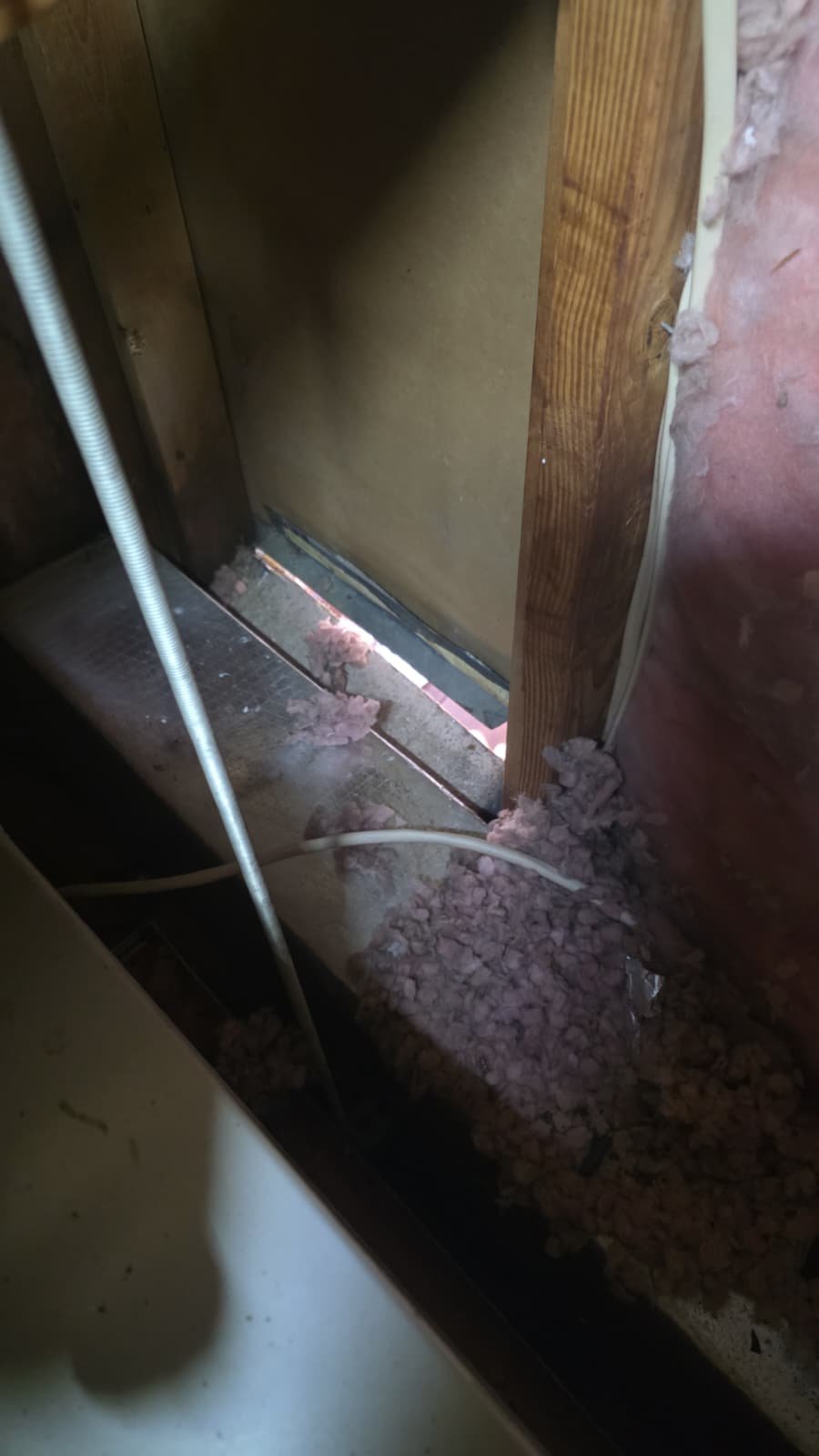 Damaged duct fiber adjusted in attic to prevent condensation in Tampa, FL 33624 home