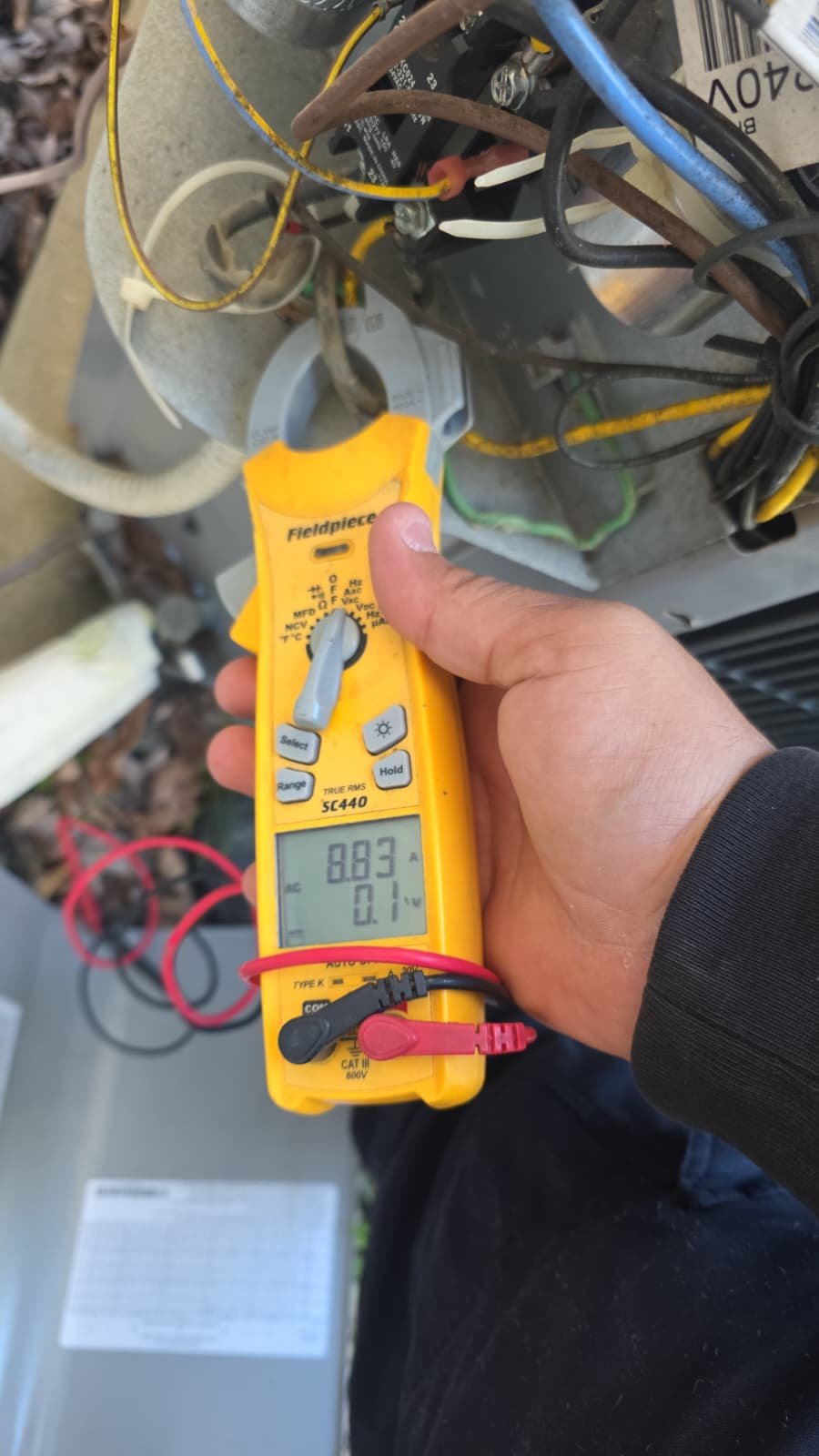 Compressor check during routine AC preventive maintenance in Tampa, FL 33626