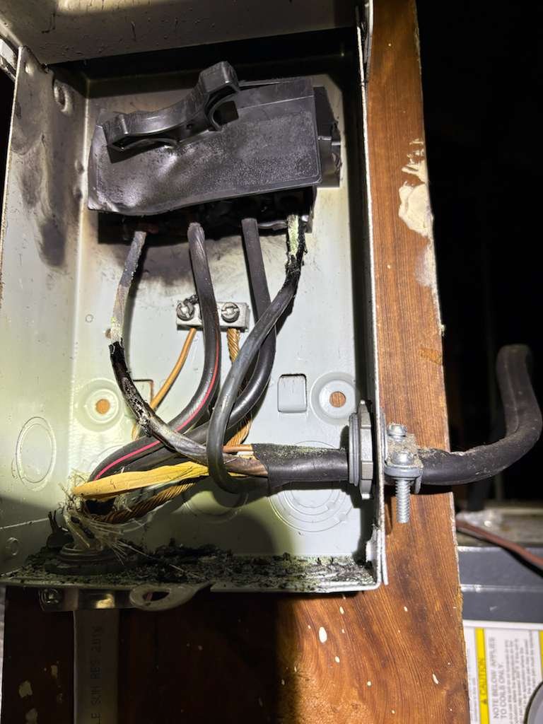 Side view of new AC disconnect wiring in St. Petersburg FL 33712