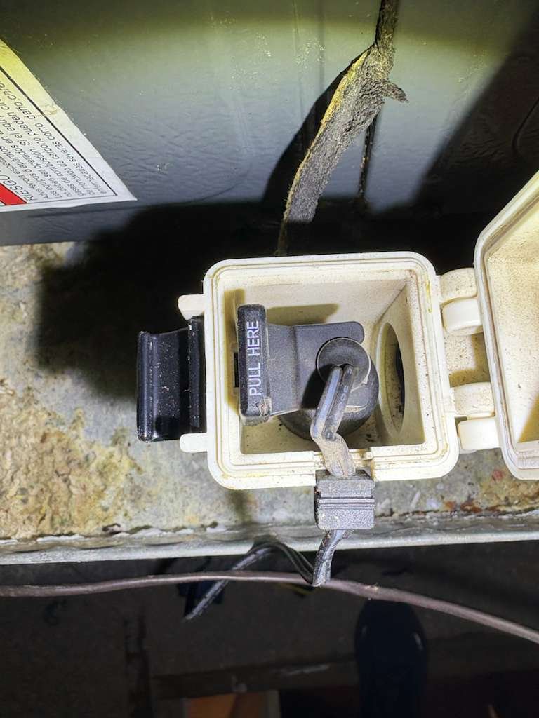 Detail of weatherproof AC disconnect cover in St. Petersburg FL 33712