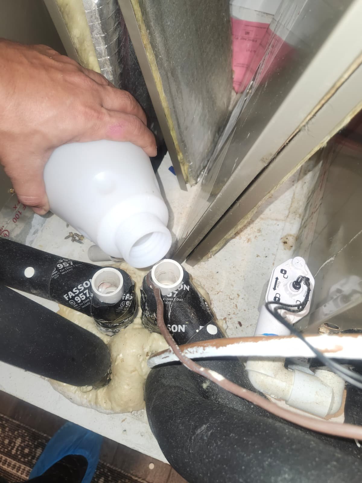 Carrier condenser inspection during AC maintenance in Spring Hill, FL 34610