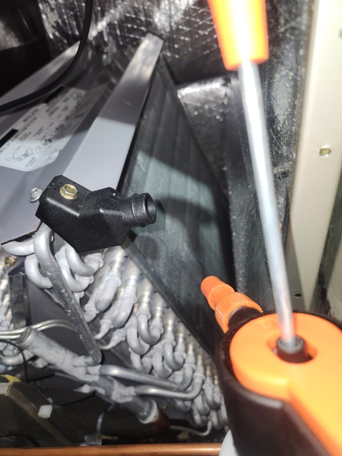 Professional AC tune-up service on residential unit in Tampa, FL 33610