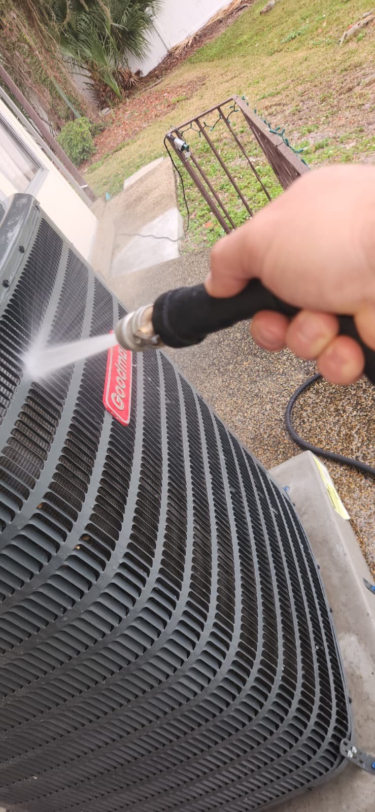 Technician performing home system maintenance in Lakeland, FL 33801