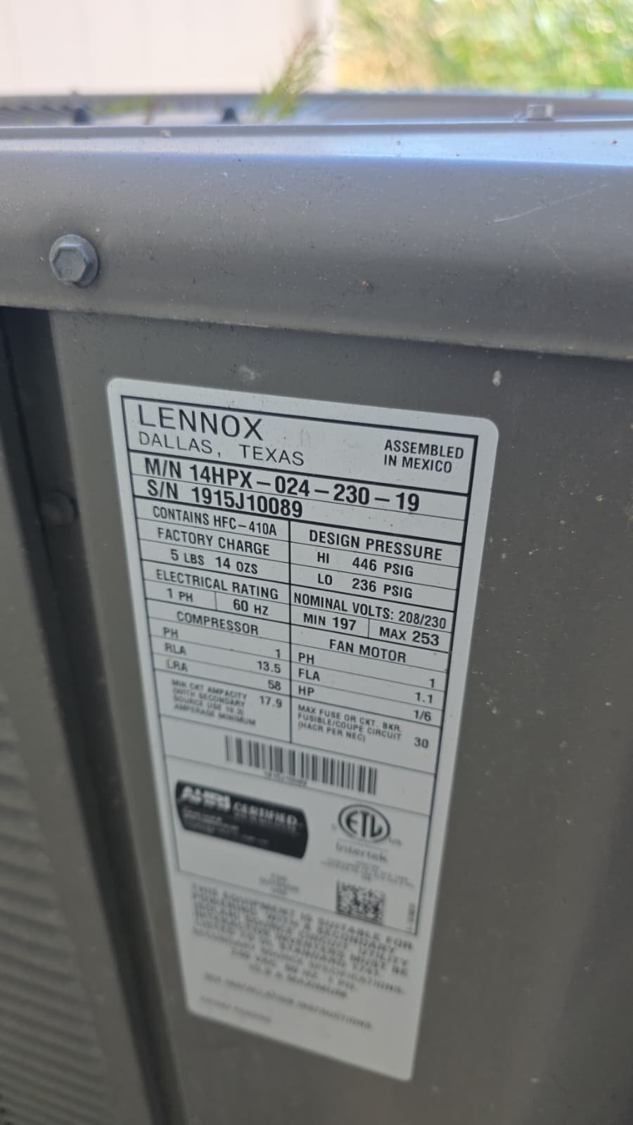 HVAC drain line cleaning during AC tune-up in Tampa, FL 33619