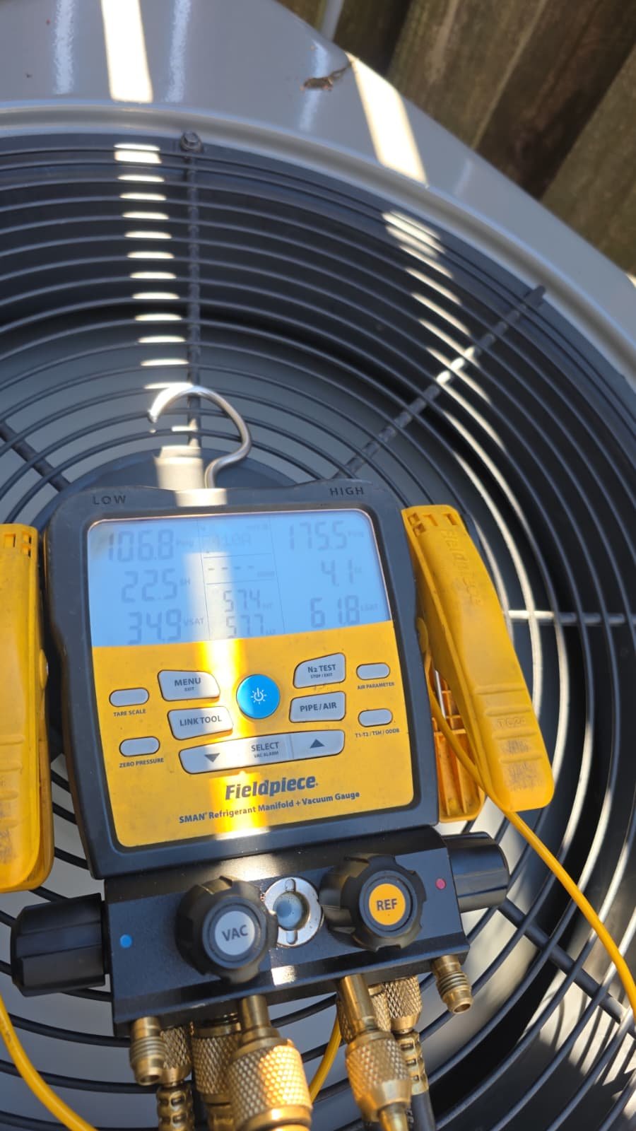 Dual compressor amperage check during HVAC maintenance in Clearwater, FL 33763