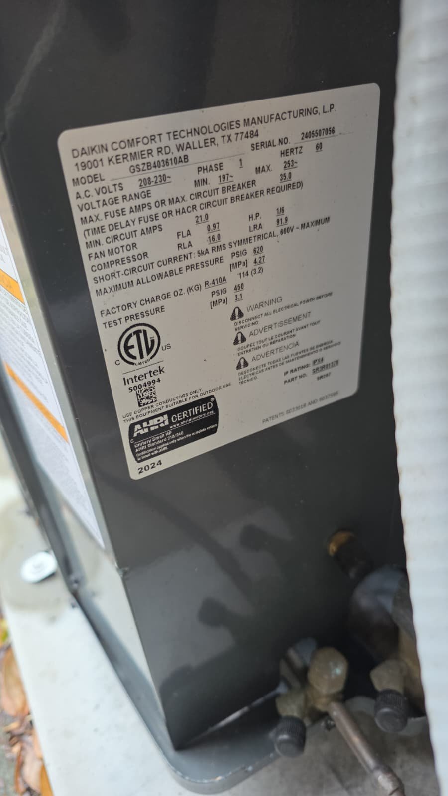 Checking refrigerant pressures on HVAC system in Tarpon Springs, FL 34688