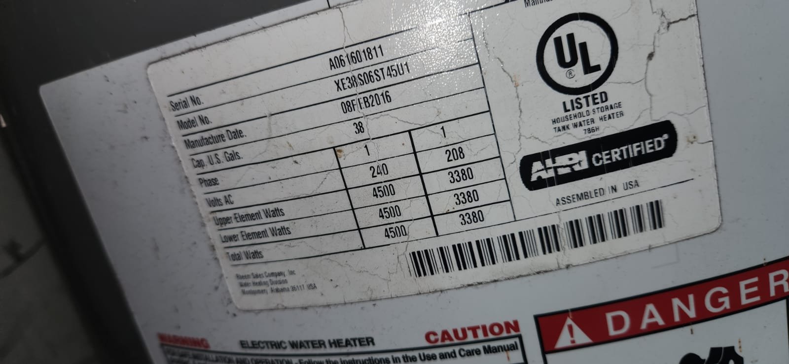 Close-up of repaired water heater piping connections in Largo, FL 33770 garage