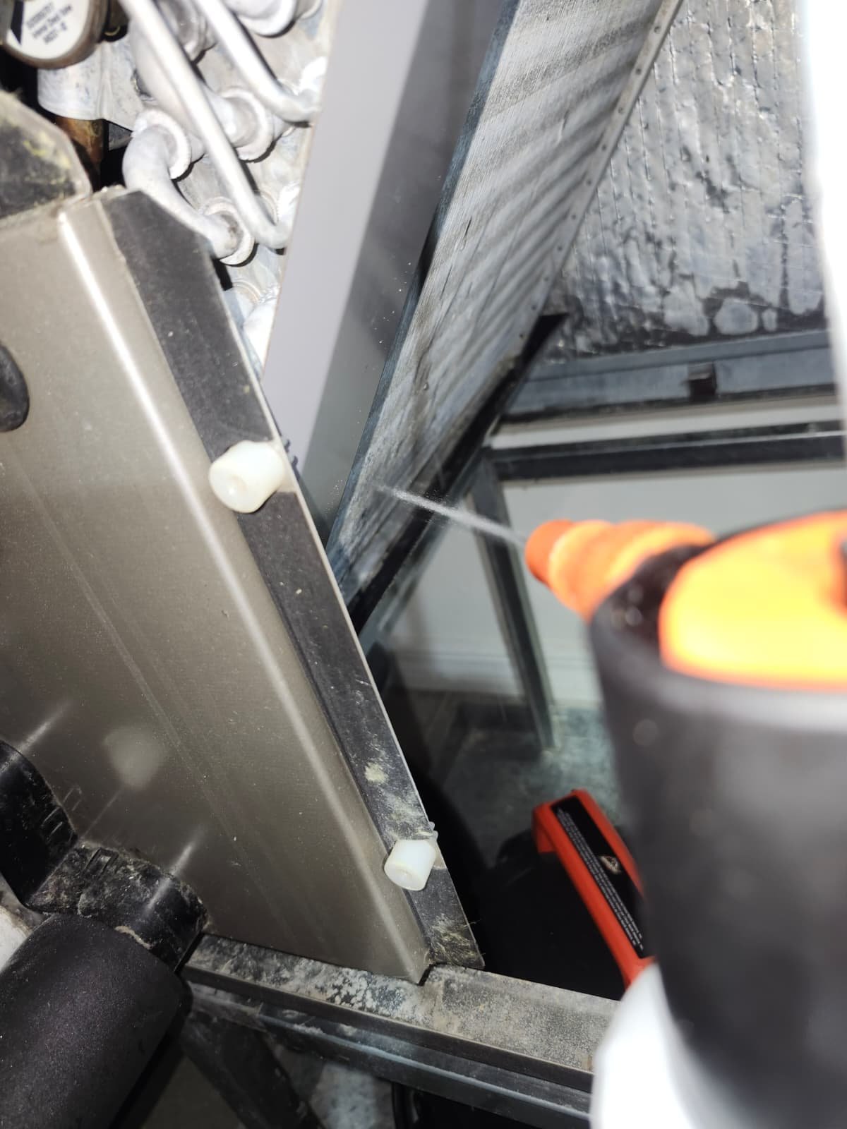 Condenser fan inspection during AC service in Tampa, FL 33610