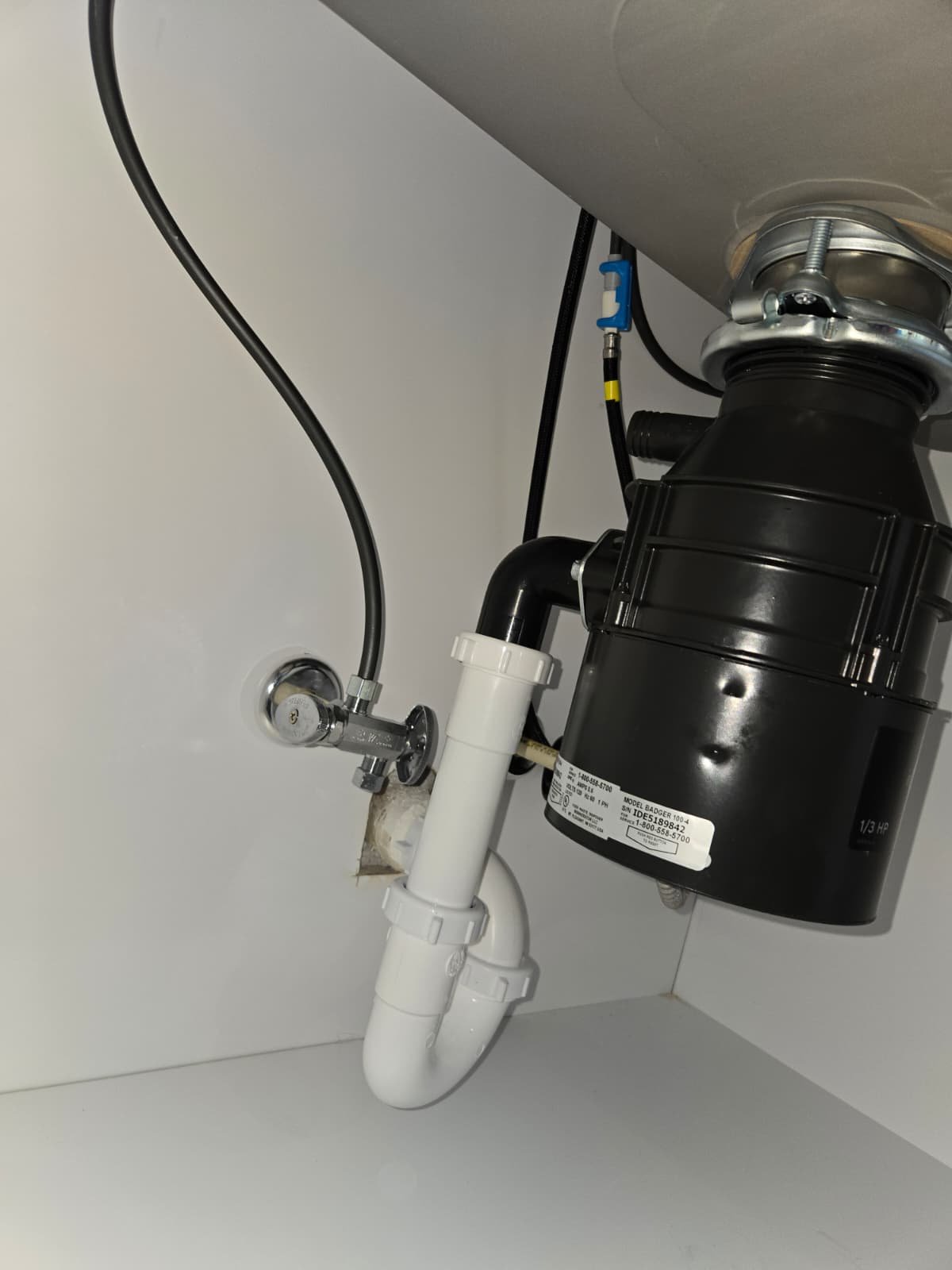 Completed garbage disposal install under kitchen sink in St. Petersburg, FL 33703