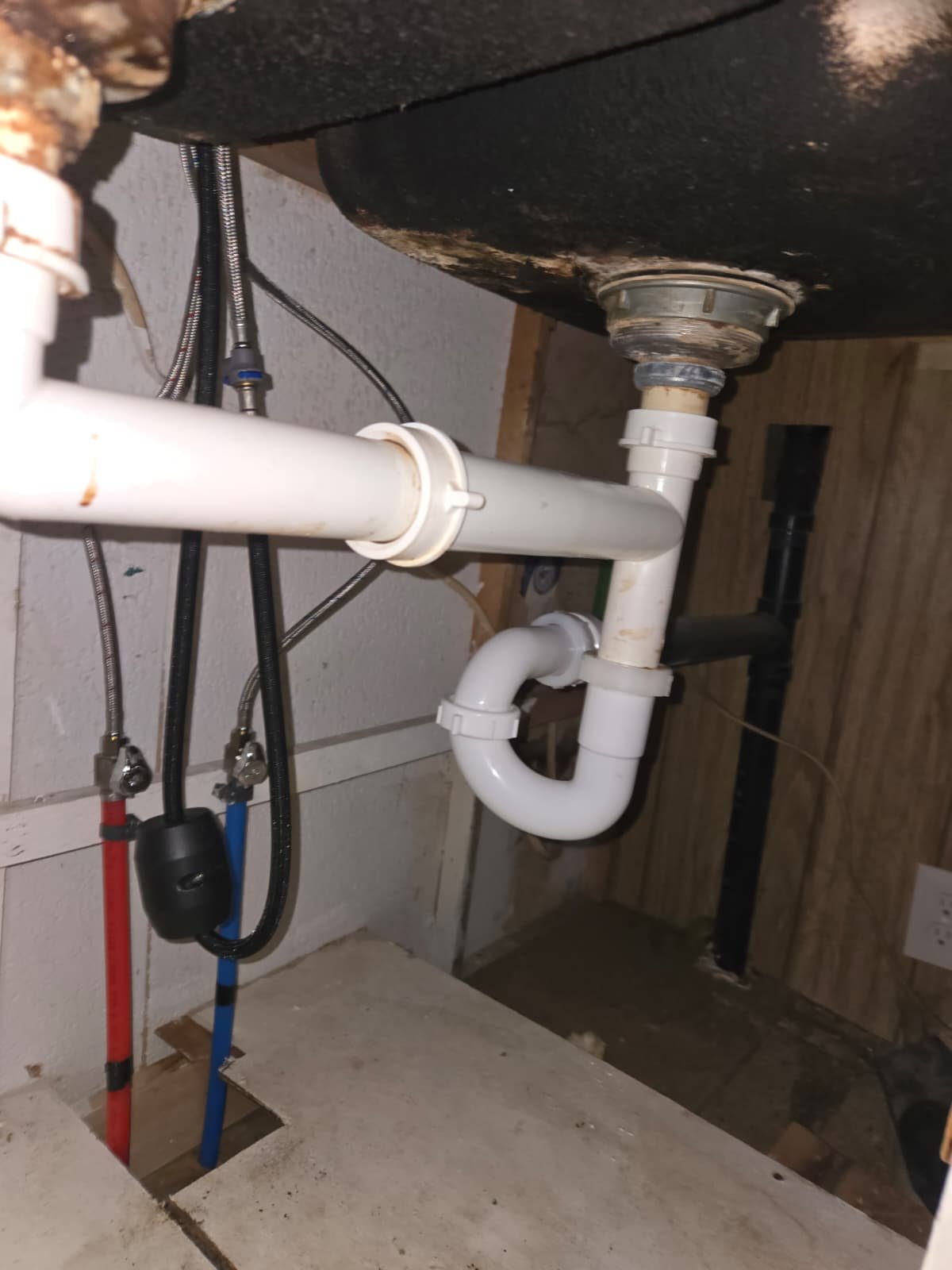 Plumber snaking main sewer cleanout for clog removal in Ruskin, FL 33570