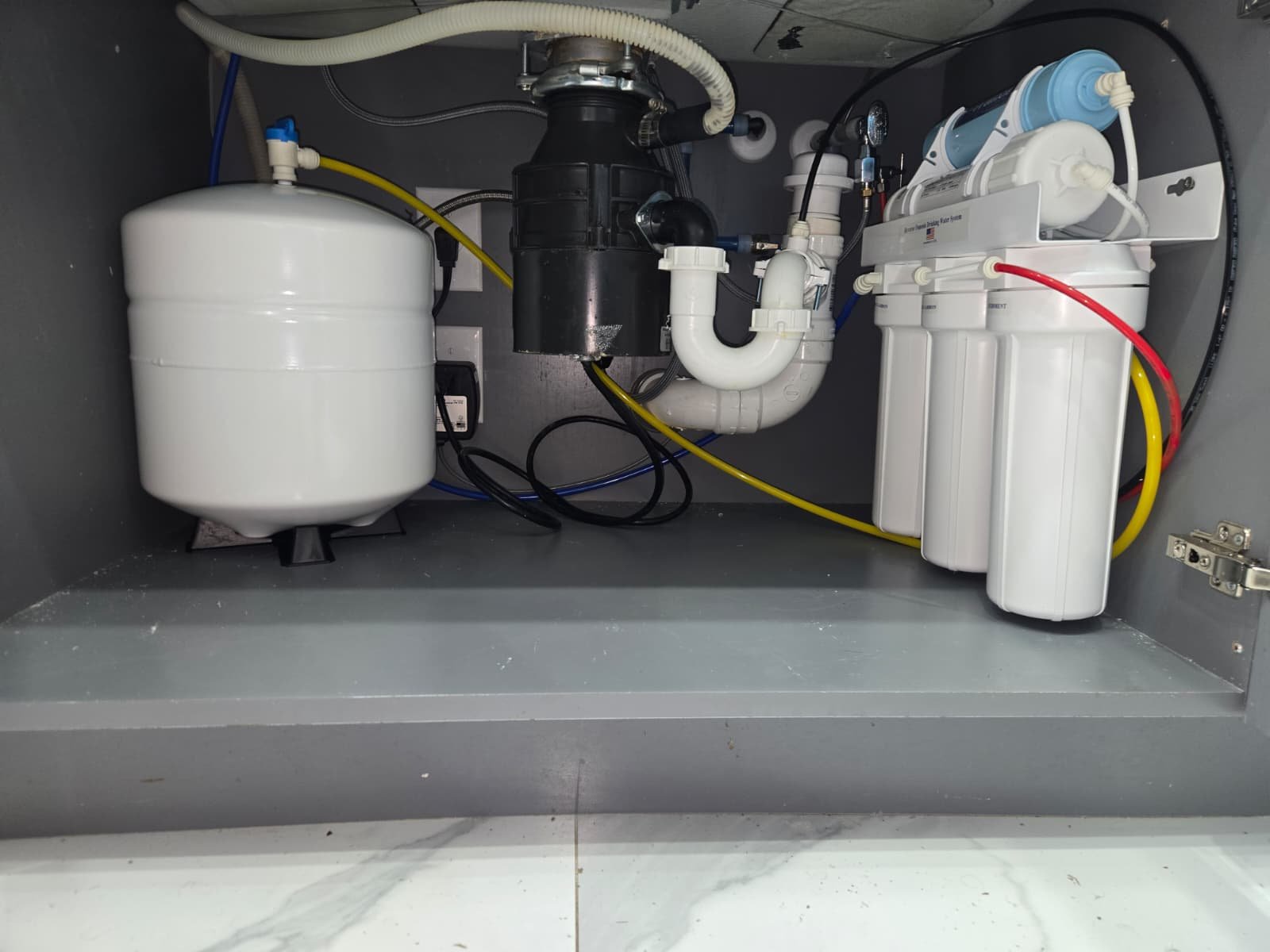 Plumbing therapist completing water softener and RO install in Apollo Beach, FL 33572