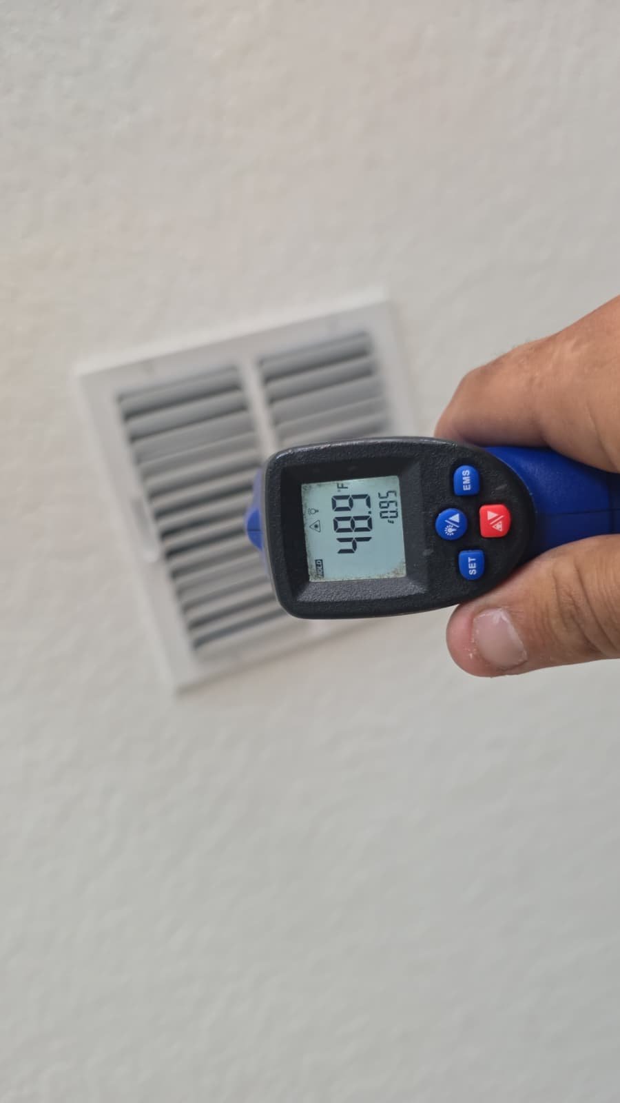 Mounted Honeywell T4 Pro thermostat after installation in Palmetto, FL 34221