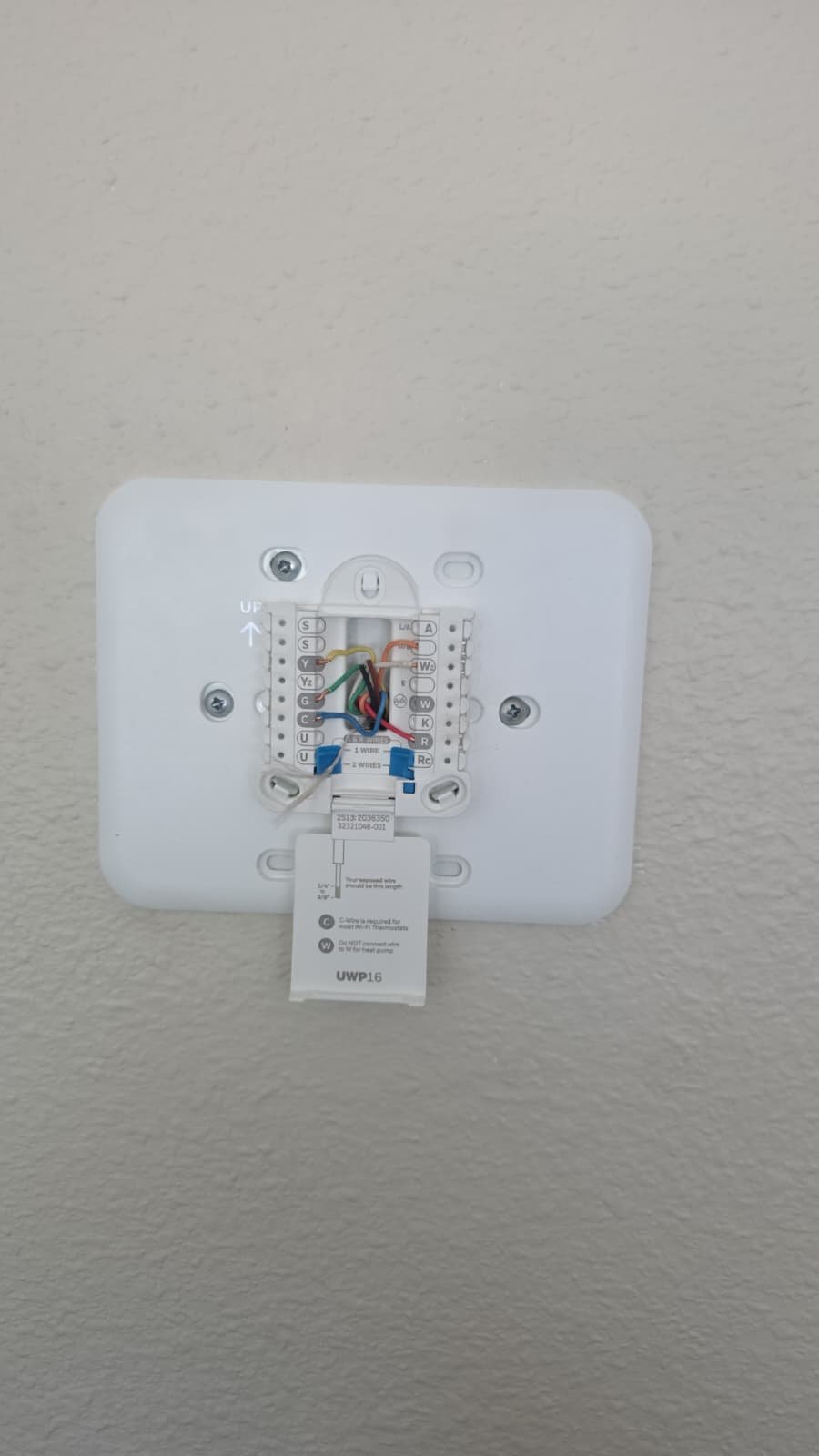 Side view of thermostat replacement project in Palmetto, FL 34221 home