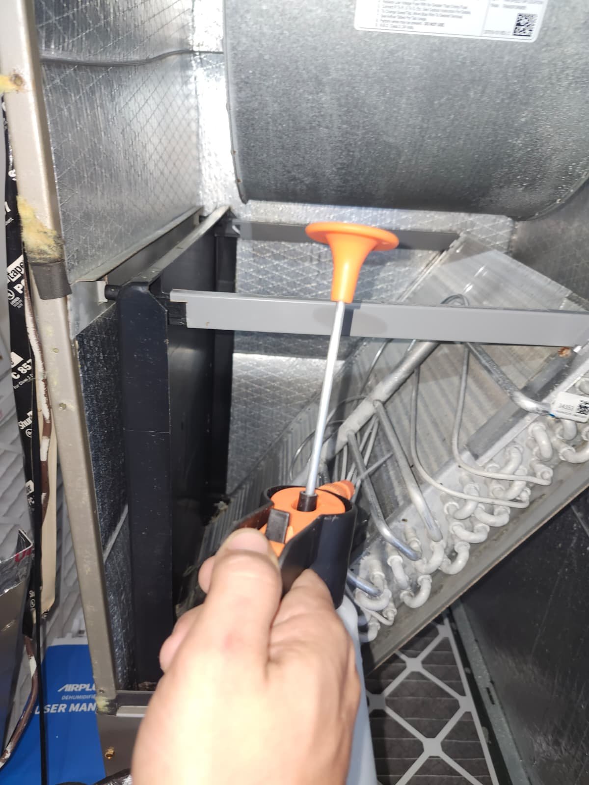 AC maintenance on Carrier unit fan assembly in Valrico, FL 33596