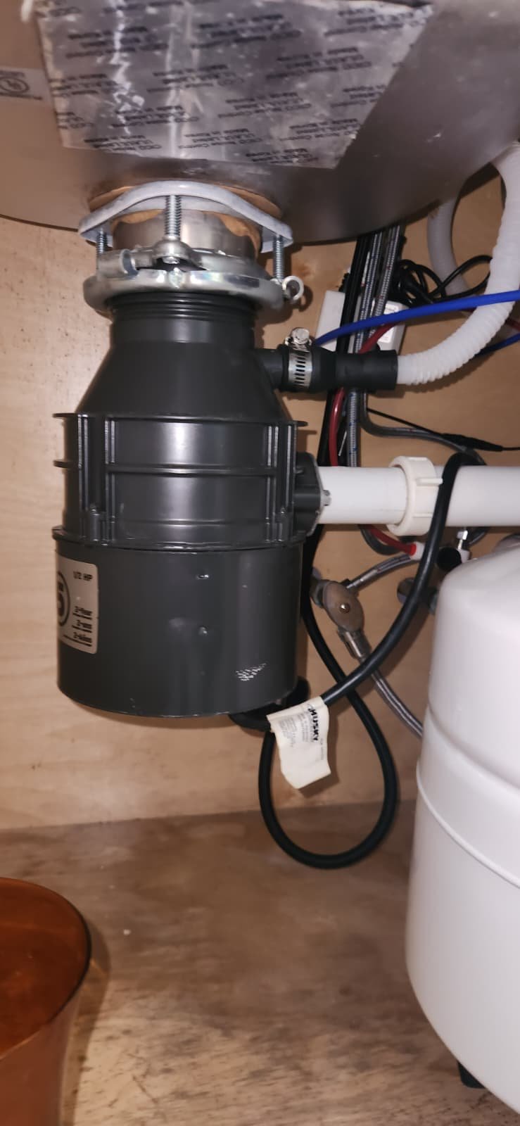Tankless water heater maintenance during plumbing inspection in St. Petersburg, FL 33704