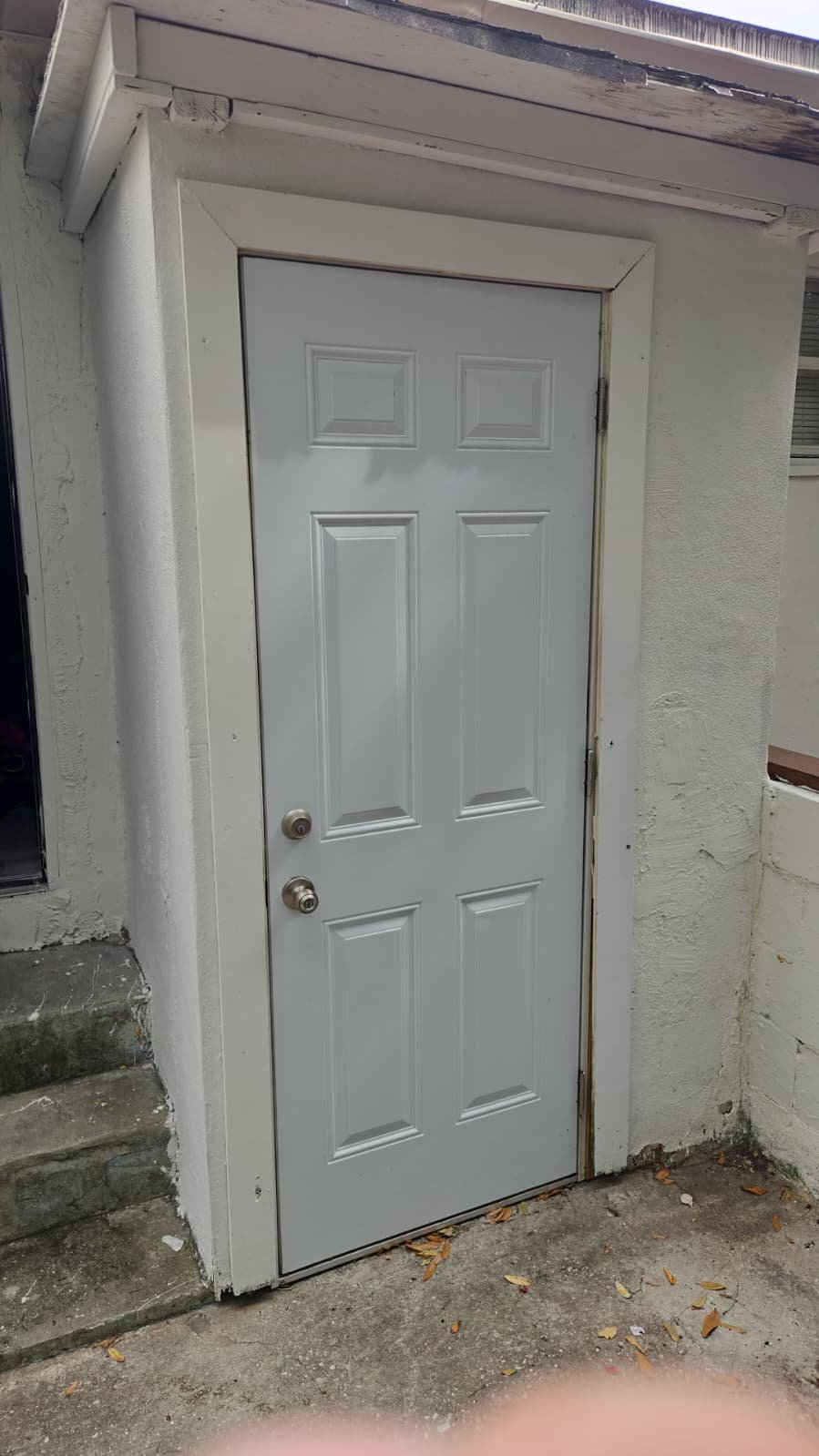 Tampa, FL 33610 plumber clearing drain line via outdoor cleanout access