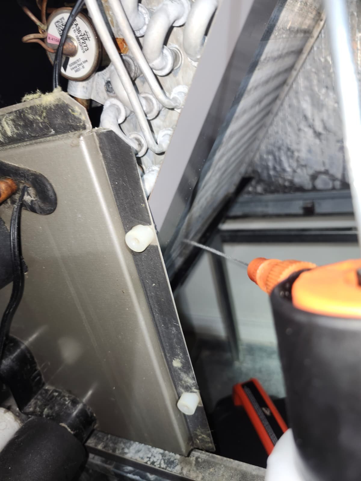 Detail of condenser fan motor during AC maintenance in Tampa, FL 33610
