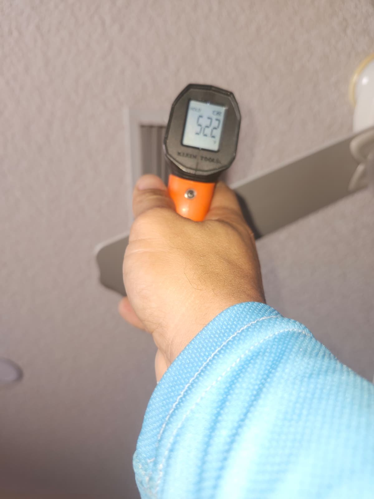 Condenser fan motor inspection during HVAC maintenance in Tampa, FL 33647