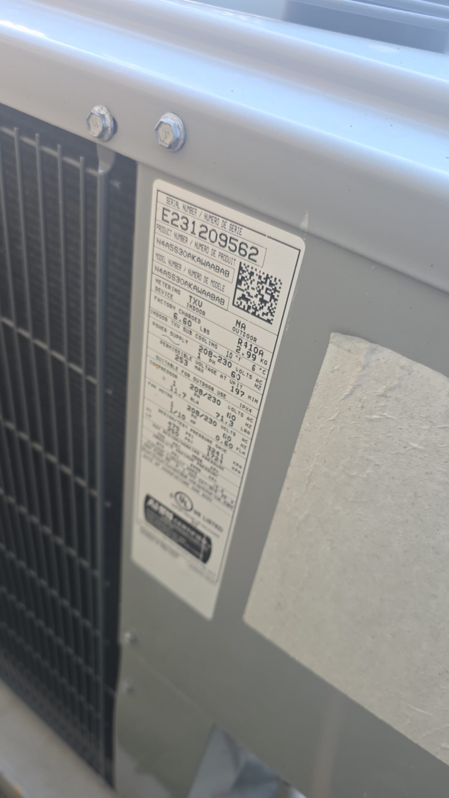 AC unit label close-up in Tampa, FL 33615
