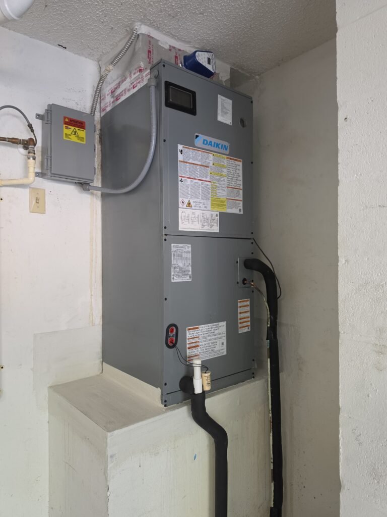 A new Daikin indoor unit mounted on a stand in a utility room in Tampa, FL 33624.