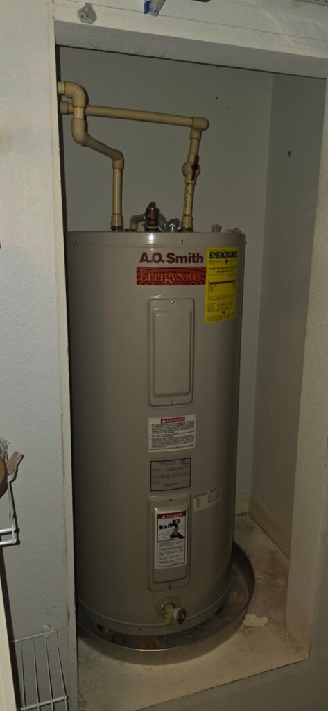 An A.O. Smith tank water heater in a closet in Valrico, FL 33594.