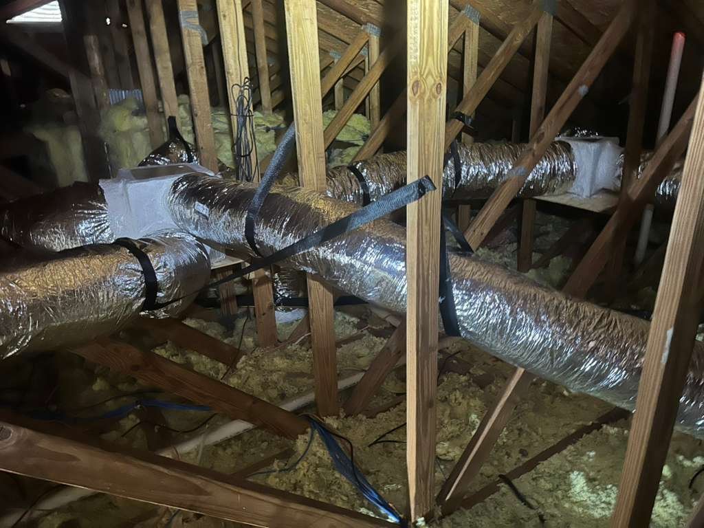 New R-6 flex duct runs in an attic in Tampa, FL 33624.