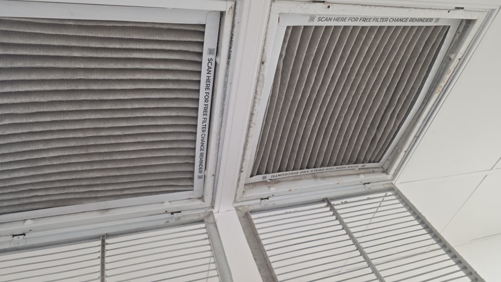 Dirty air filters in ceiling vents before Value Quarterly Service in Wesley Chapel, FL 30004.