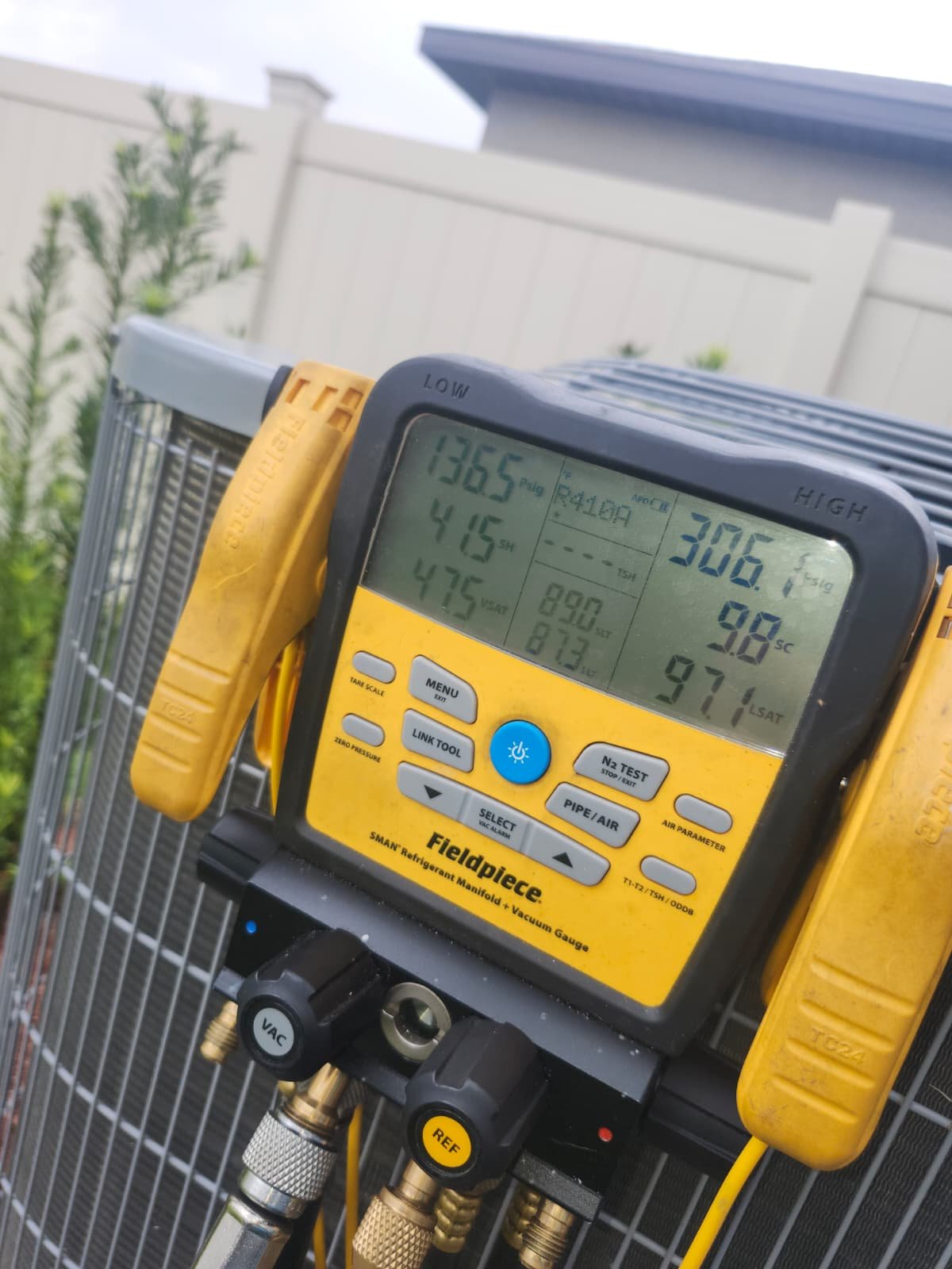 Close-up of HVAC diagnostic tool with readings during maintenance in Wimauma, FL 33598.