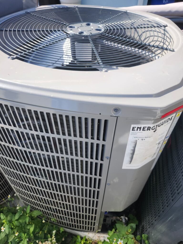 An outdoor AC unit with its EnergyGuide label in Tampa, FL 33624.