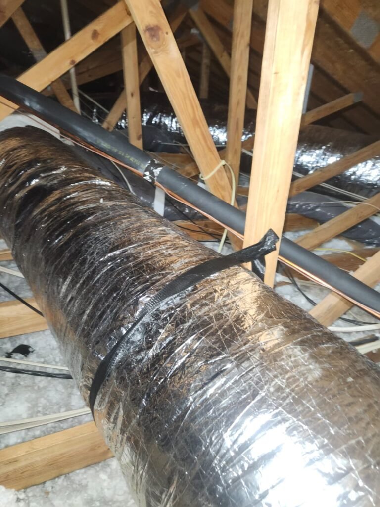 R-6 flex duct strapped in an attic in Lutz, FL 33558.