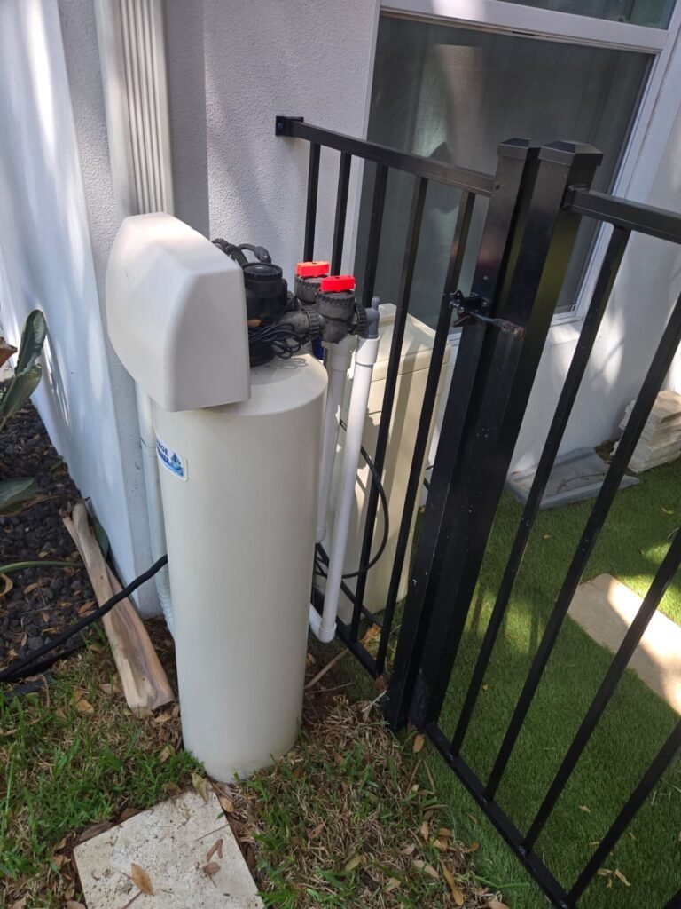 A water softener installed outside a home in Tampa, FL 33606.