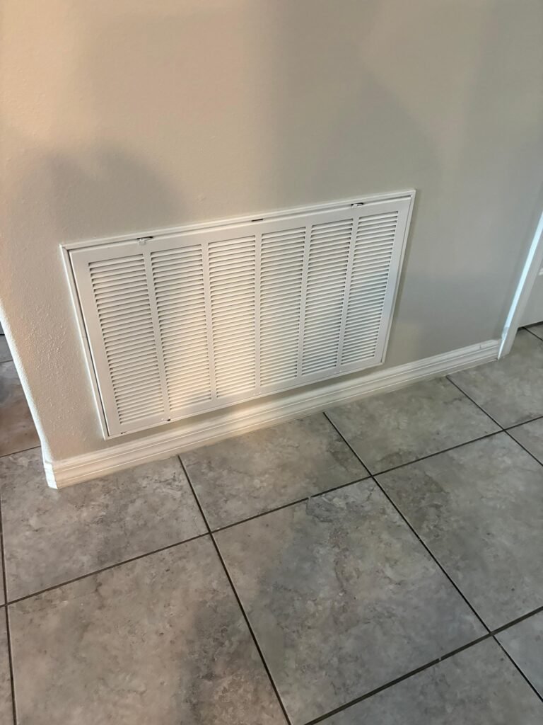 A wall return air grille in a home in Wimauma, FL 33598.