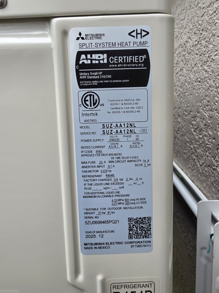 The rating label on a Mitsubishi split-system heat pump in Land Oβ Lakes, FL 34639.