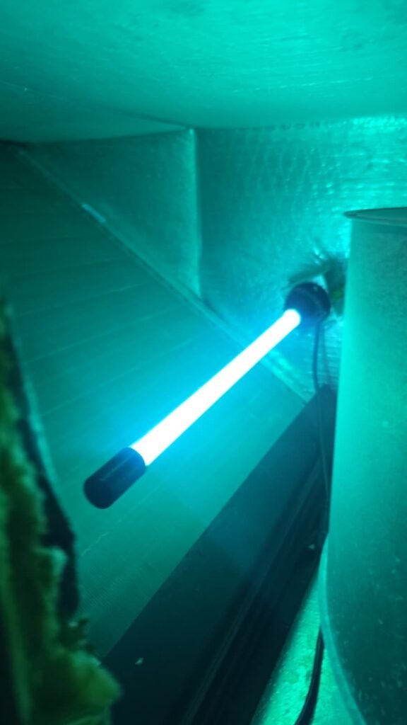 A UV light glowing inside the ductwork of a home in Sun City Center, FL 33573.