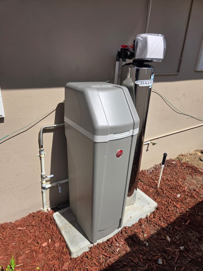 Water softener system installed on concrete pad in New Port Richey, FL 34652.