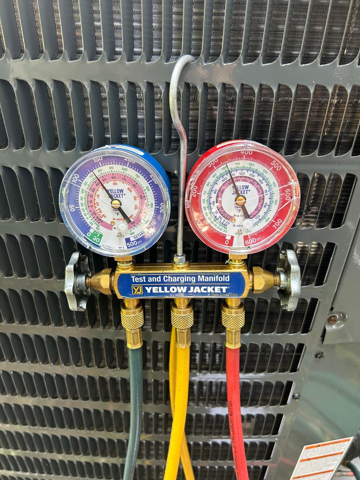 Close-up of test and charging manifold gauges, Oldsmar, FL 34677.
