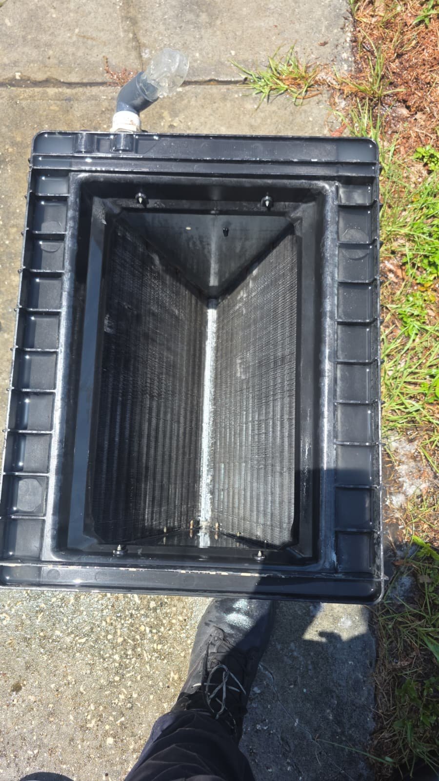 Clean HVAC Coil in St. Petersburg, FL 33711 Clean HVAC coil in black housing in St. Petersburg, FL 33711.