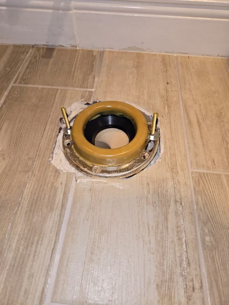 A new wax ring on the toilet flange over the drain in Riverview, FL 33579.