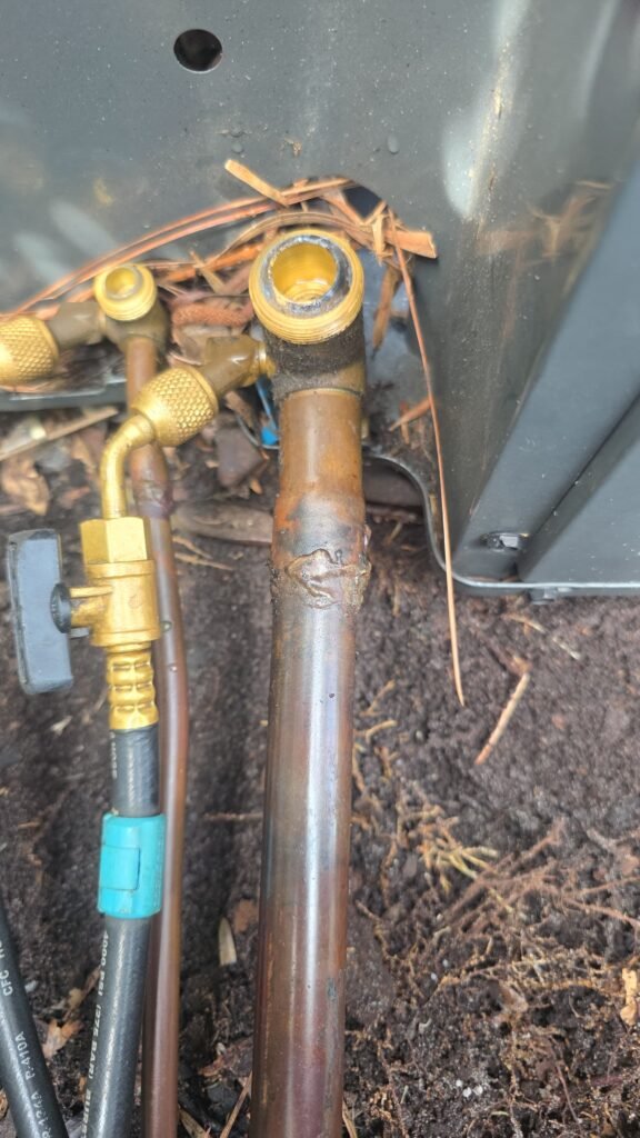 Close-up of copper pipe with potential leak in Tampa, FL 33626.