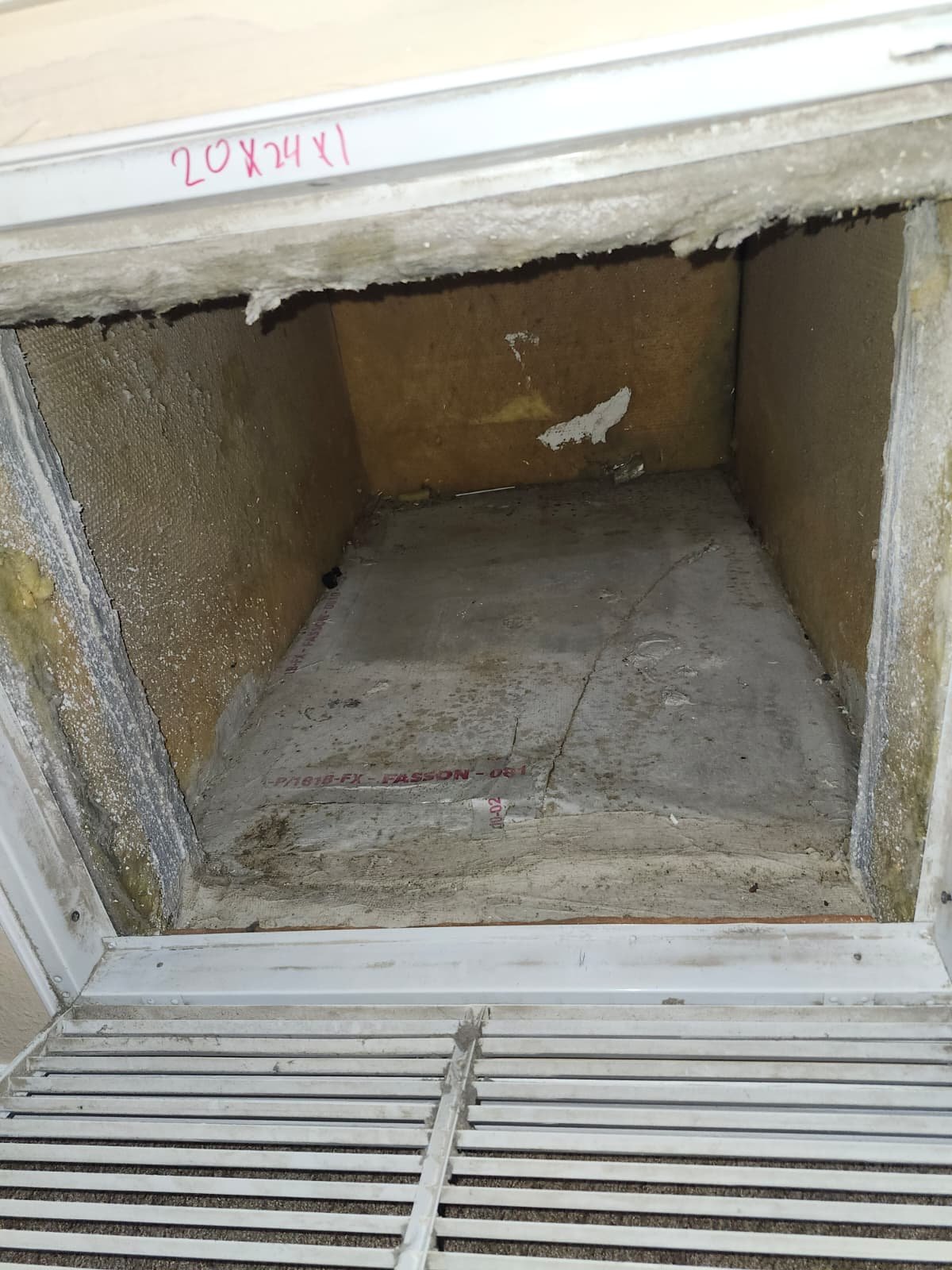 Air duct with dirt and debris before cleaning in Lutz, FL 33558.