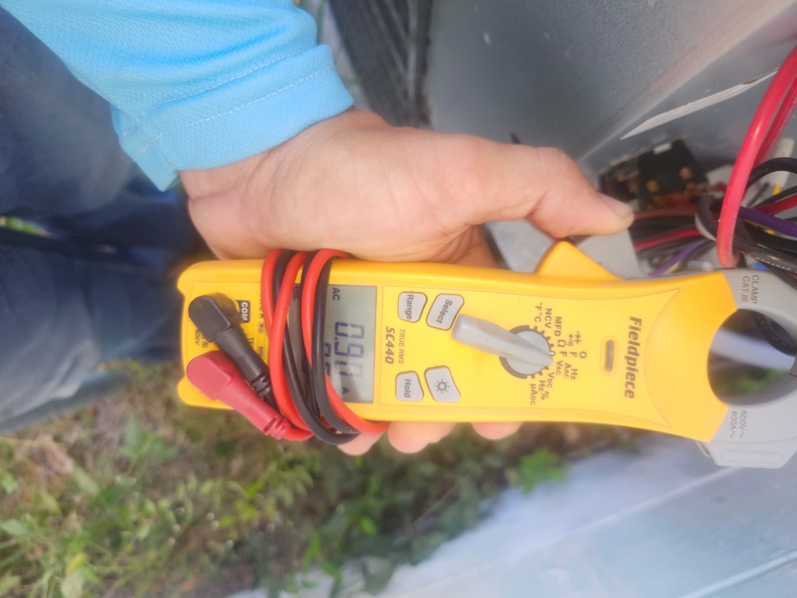 Electrical Check with Multimeter - Tampa, FL 33611 Technician using multimeter to check electrical connections in Tampa, FL 33611.