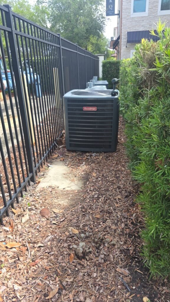 Goodman AC units installed outdoors in Tampa, FL 11588.