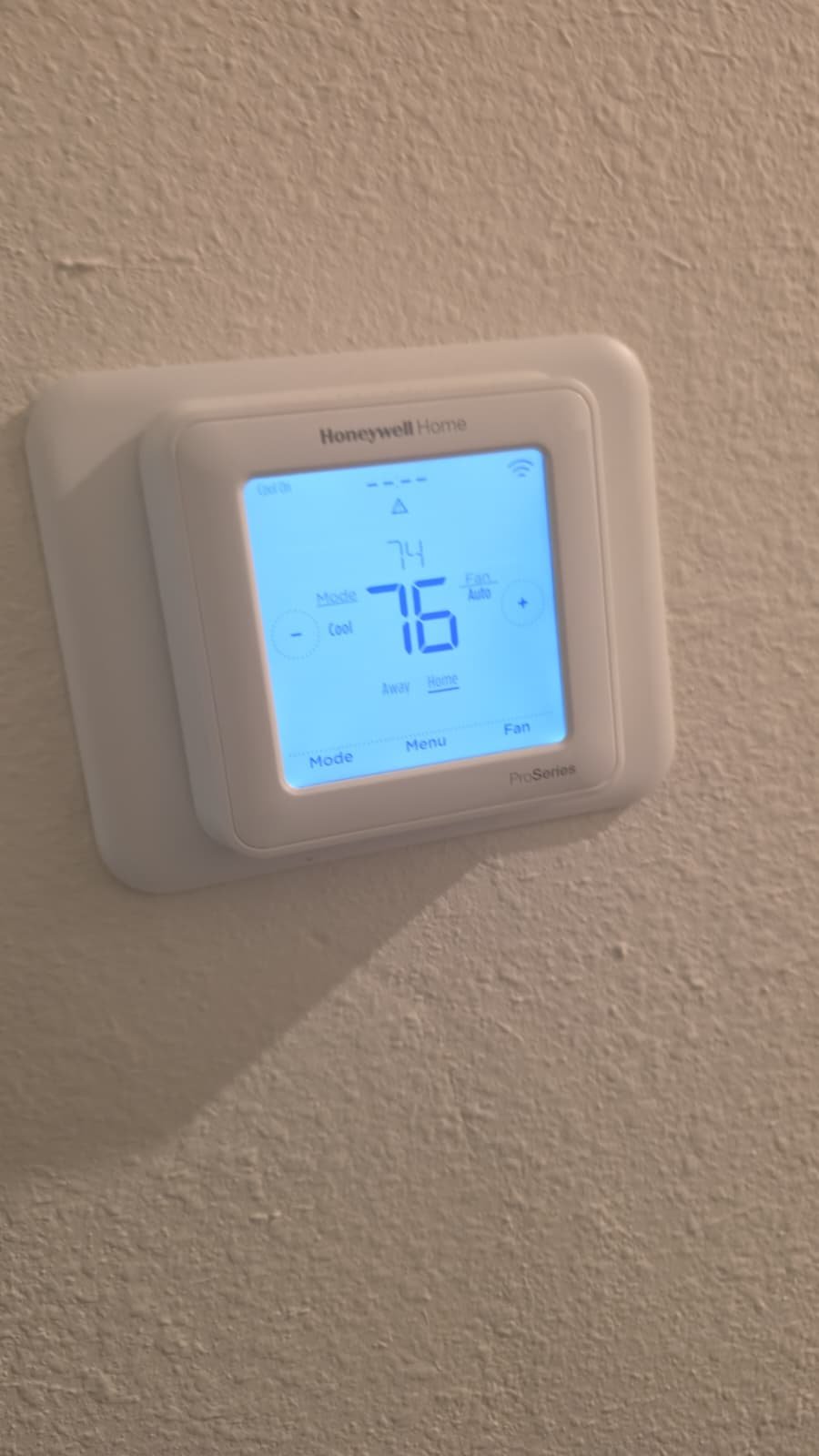 Honeywell thermostat displaying settings, Wesley Chapel, FL 33543.