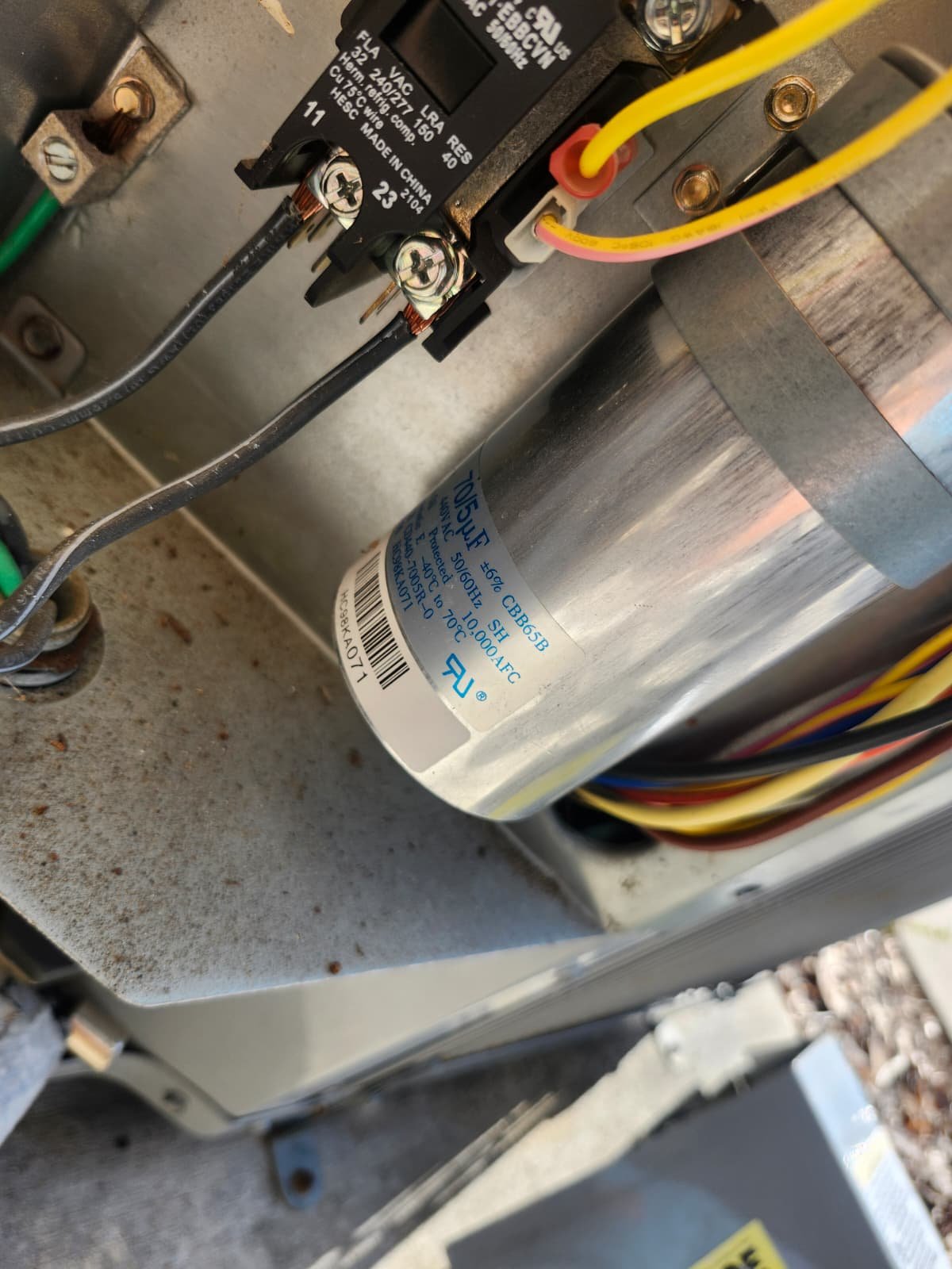 Close-up of electrical components inside an HVAC unit, New Port Richey, FL 34655.