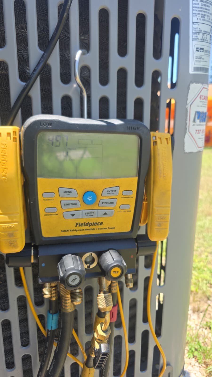 HVAC Gauge in St. Petersburg, FL 33711 Fieldpiece gauge on HVAC unit with surroundings in St. Petersburg, FL 33711.