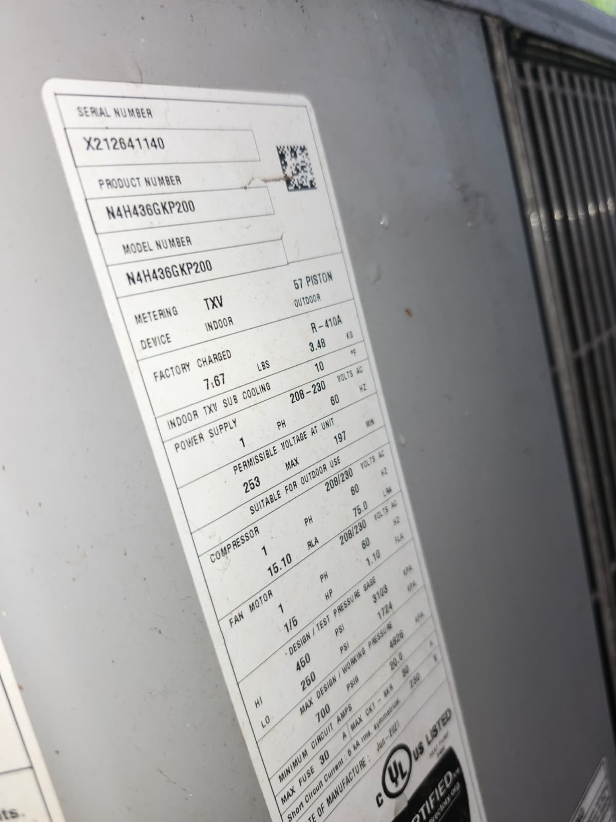 HVAC Unit Label Close-up - Tampa, FL 33604 Close-up of HVAC unit label showing model and serial number at 1300 Alicia Avenue, Tampa, FL 33604.